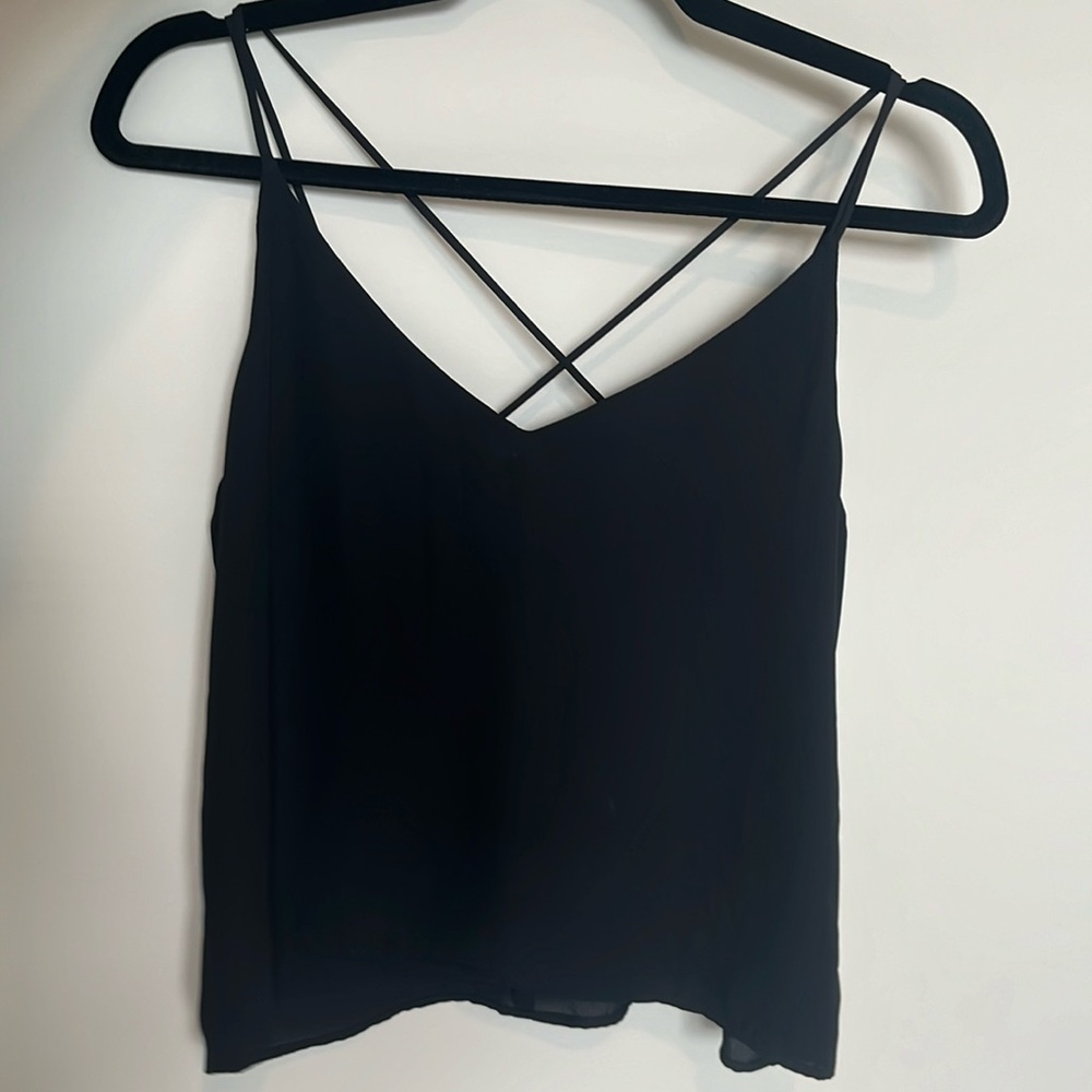 Black going out top